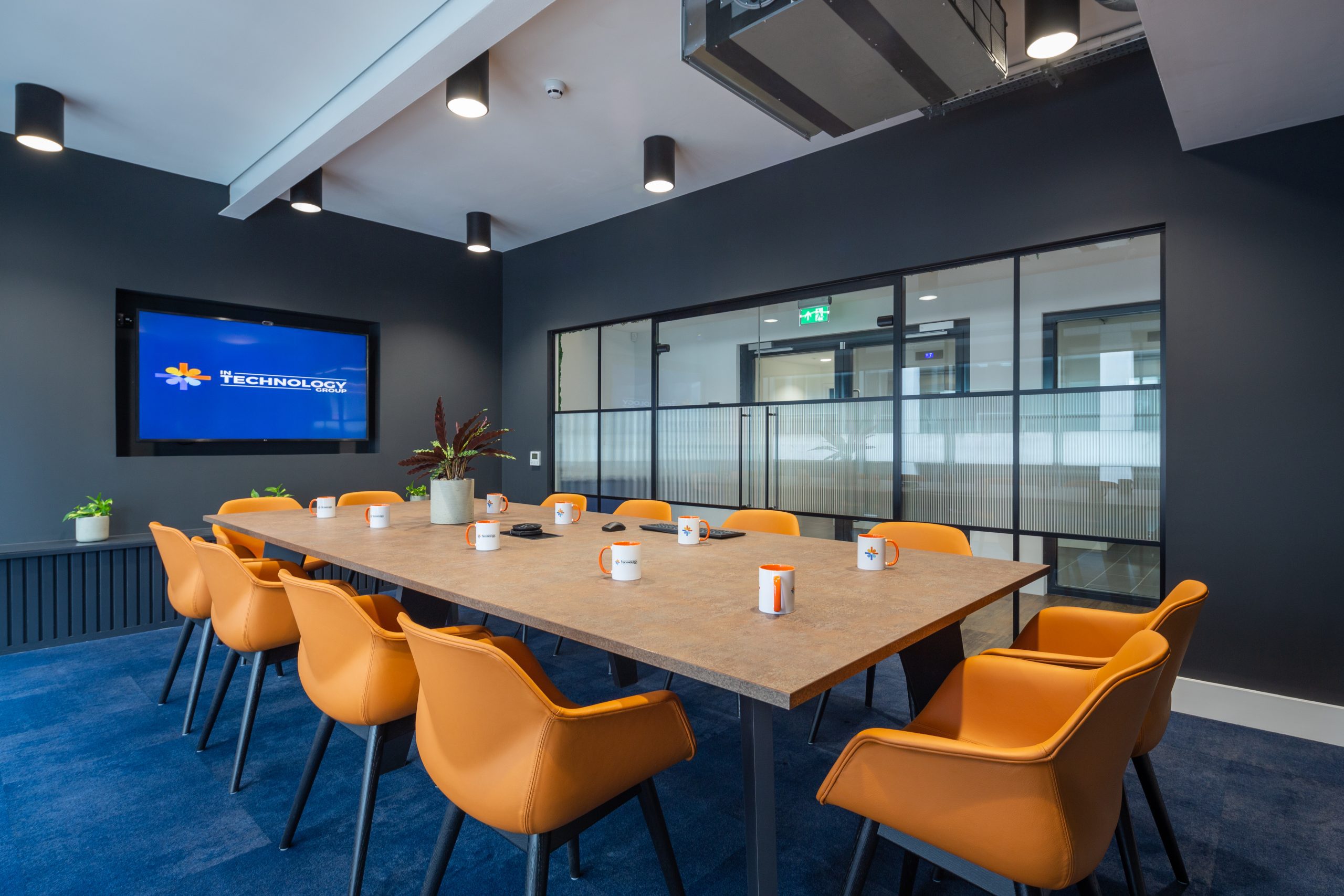 In Technology Group branded meeting room