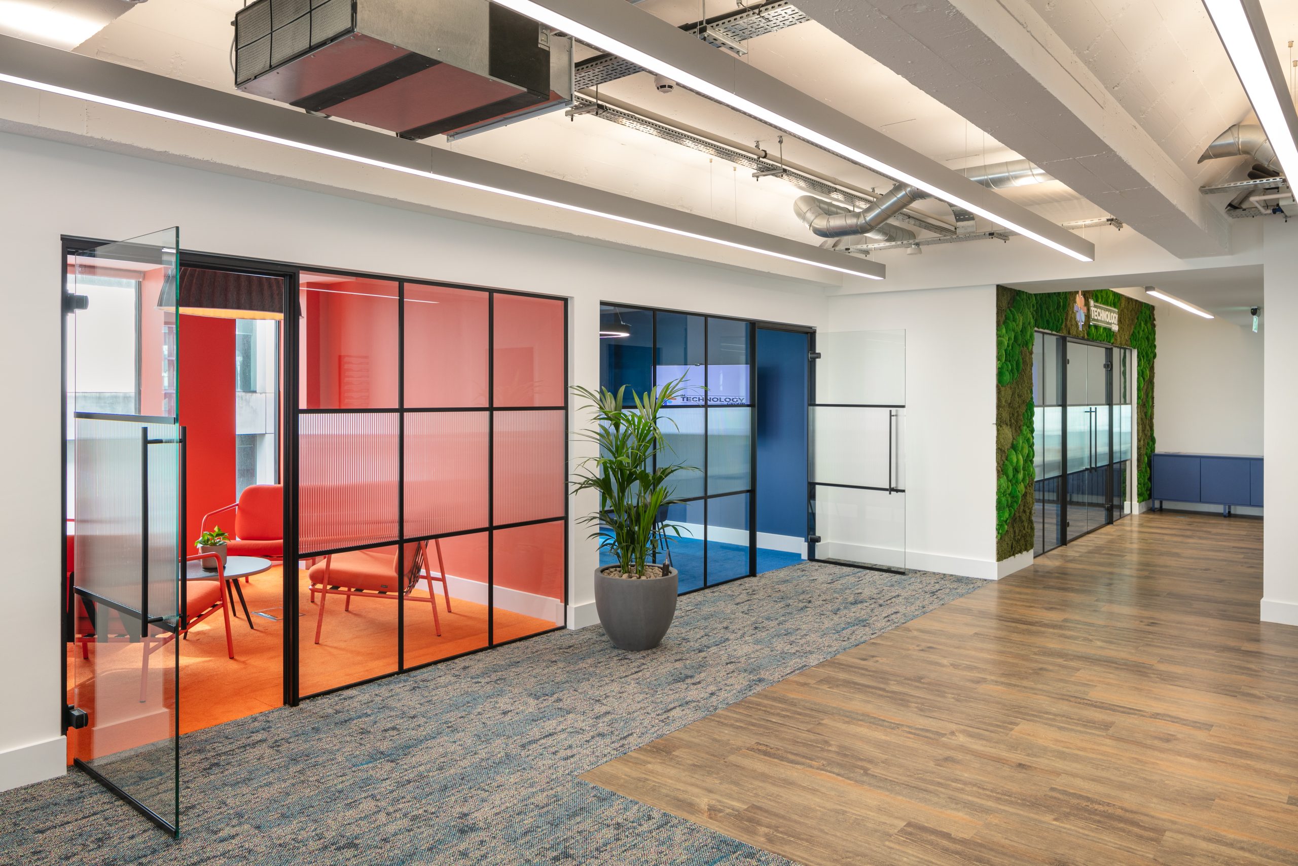 In Technology Group multi coloured meeting rooms